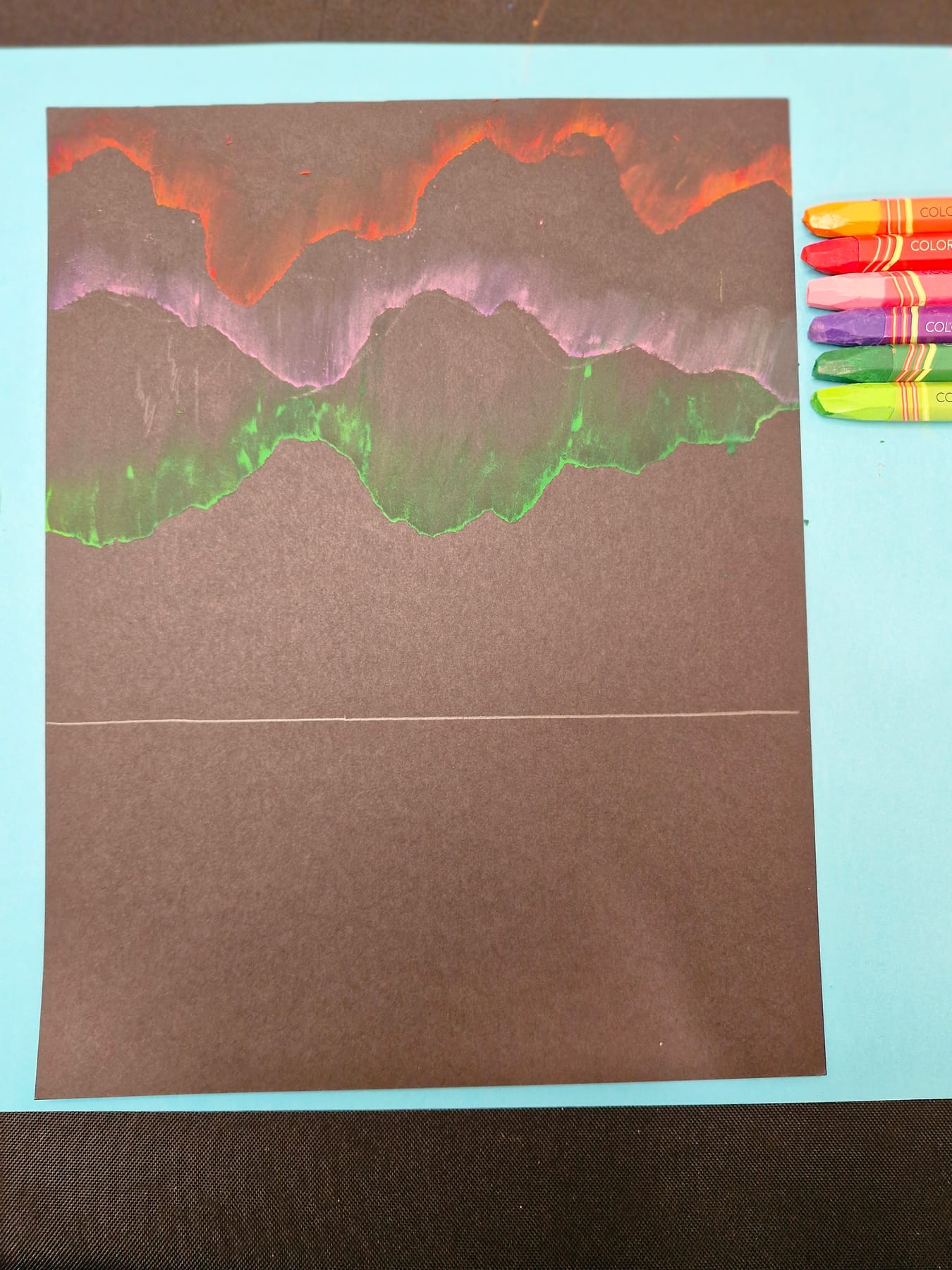 Three printed ribbons stacked up the page — green lowest, purple above it, red highest of all.